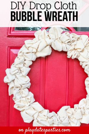 Make an easy canvas drop cloth wreath for your front door. It’s the perfect easy DIY project to update for all seasons.