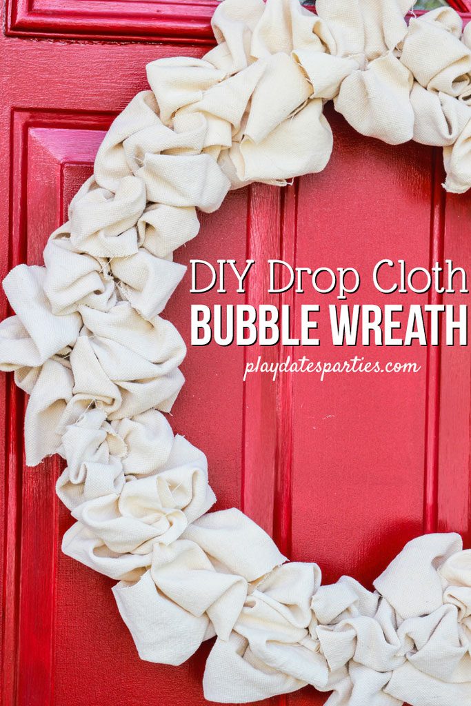 It’s hard to find the right wreath for a colorful front door. Learn how to make this easy DIY canvas drop cloth wreath that will math all color schemes. Whether you like rustic farmhouse or softer shabby chic decor, this basic fabric wreath is beautiful all year round. It’s super cheap, doesn’t take long to make and the neutral color goes from fall, through the holidays and long into winter. #wreaths #decor #DIYwreath #DIY #diyhomedecor #homedecor #frugaldecor #doordecor #falldiy #diyhomedecor