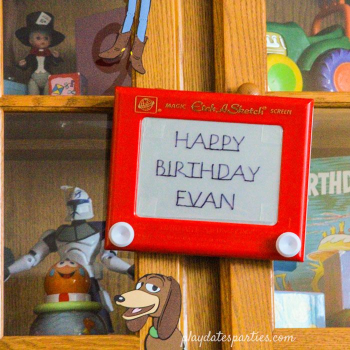 Etch a Sketch that says Happy Birthday Evan