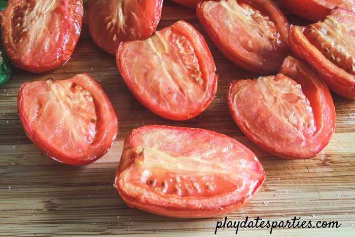 Halved plum tomatoes after being smoked.