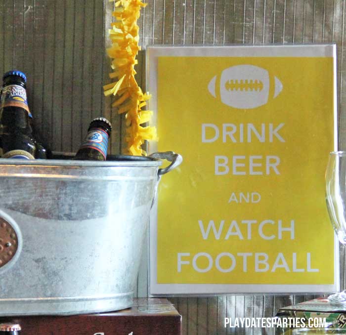 Take a look at this fun football kickoff party, including classic football fare. Don't miss the DIY chili toppings bar, hummus platter, Berger cookies, cornbread squares, and the craft beer bar.