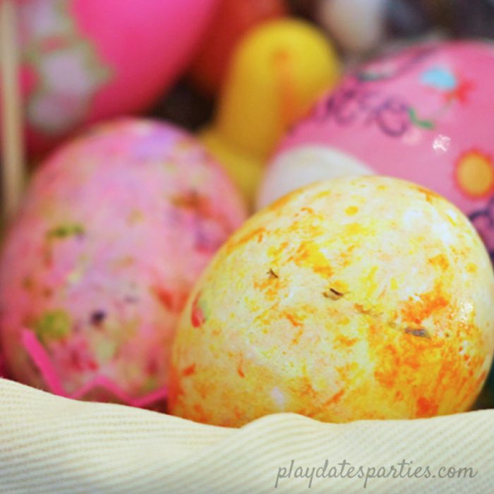 close up of yellow marbled egg for easter