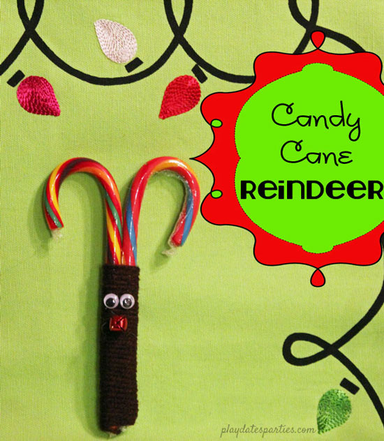 reindeer made with colorful candy canes wrapped with brown yarn and a red jingle bell nose