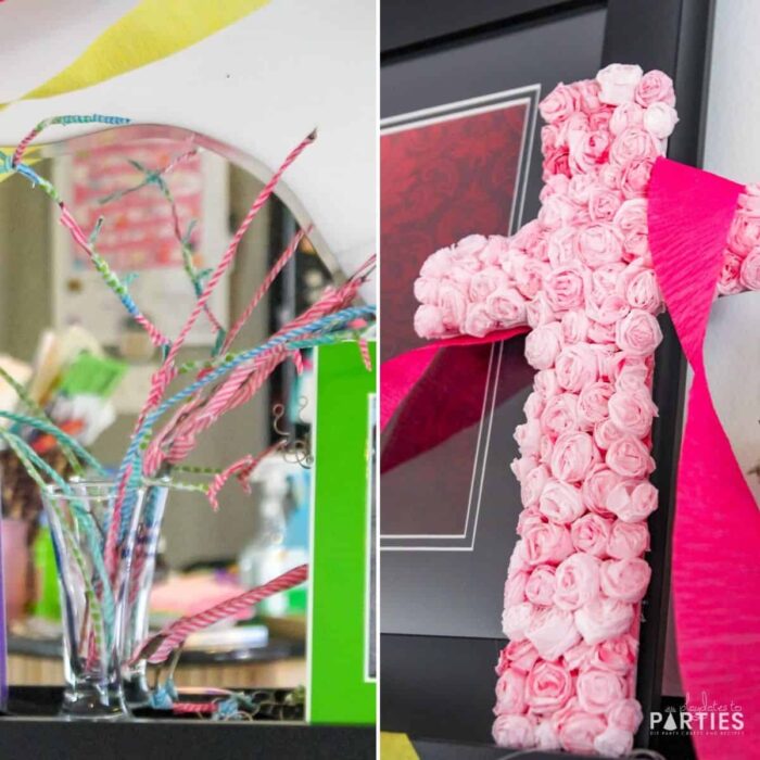 a photo of ta vase full of tree branches that are wrapped in colorful washi tape, and a cross made with tiny pink paper rosettes