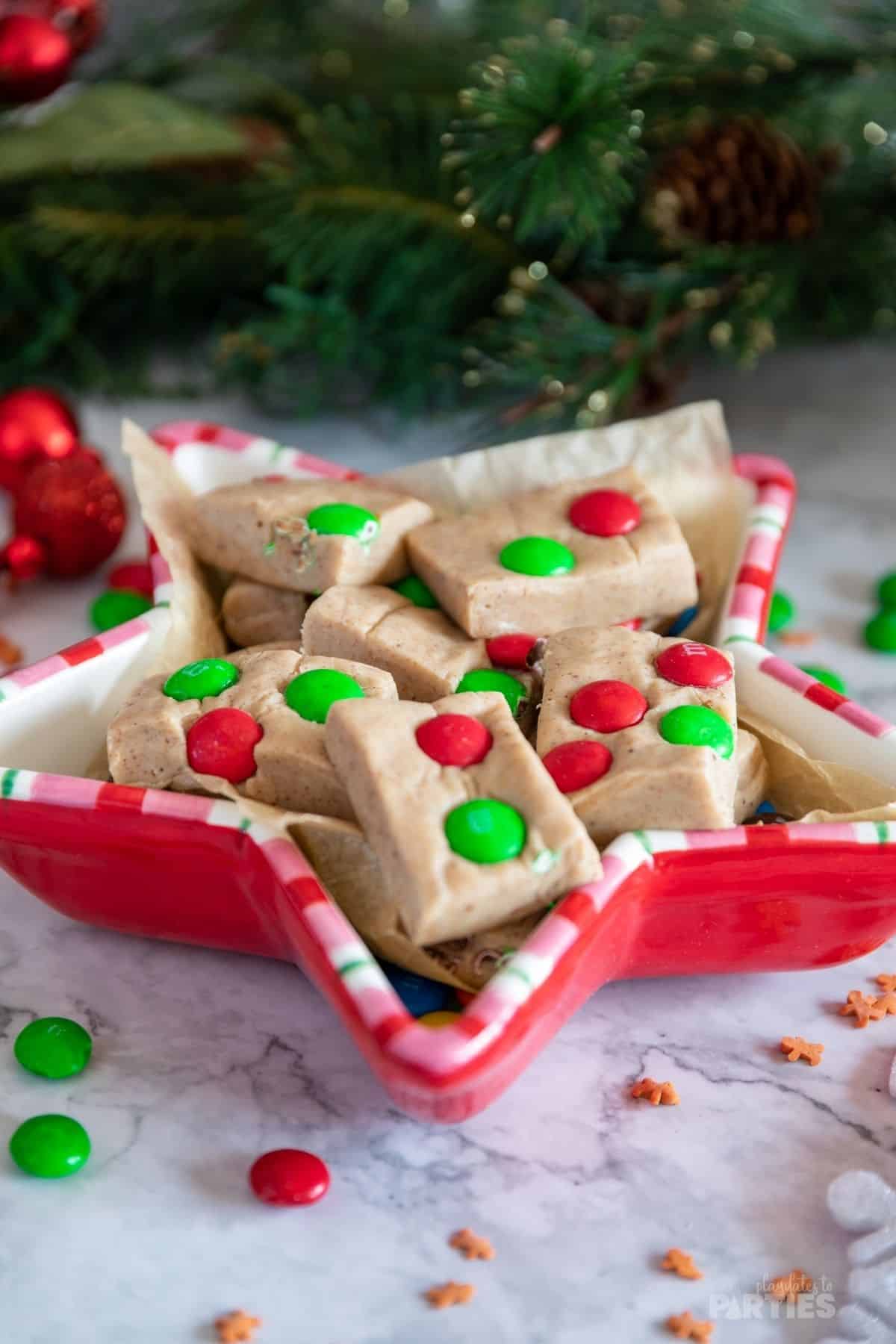 Gingerbread fudge is set in a small bowl for Christmas party guests to enjoy