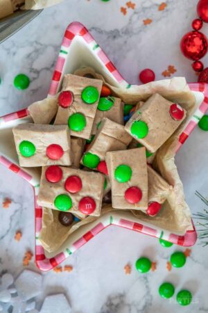 Gingerbread fudge pieces in a star shaped Christmas bowl.