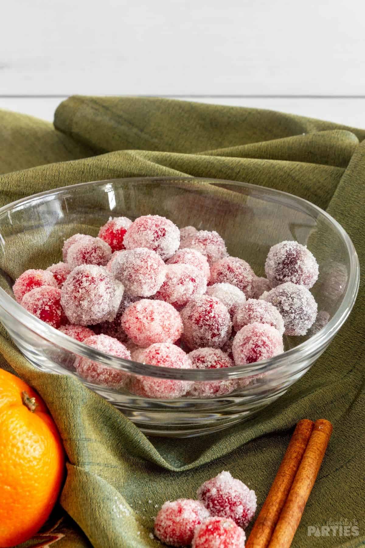 Sugared cranberries in a bowl.