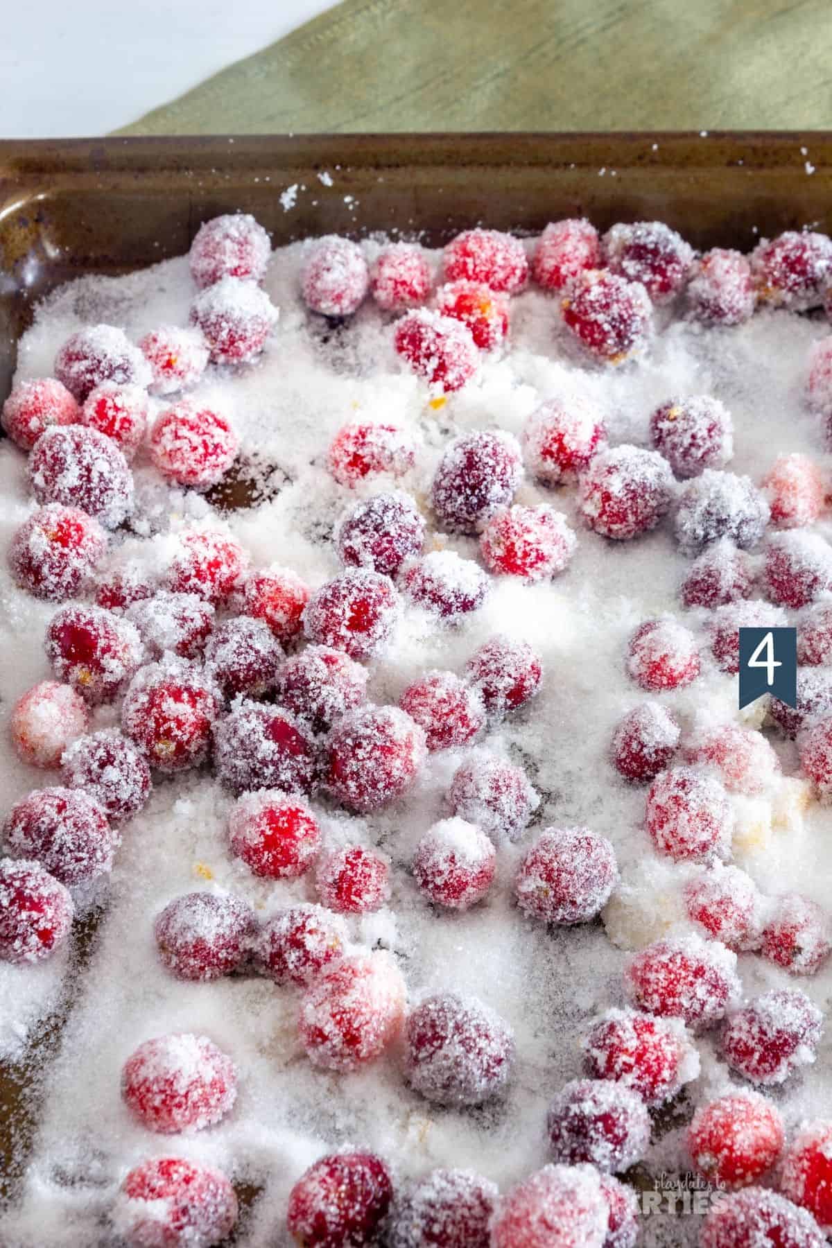 Sugared cranberries on a pan.