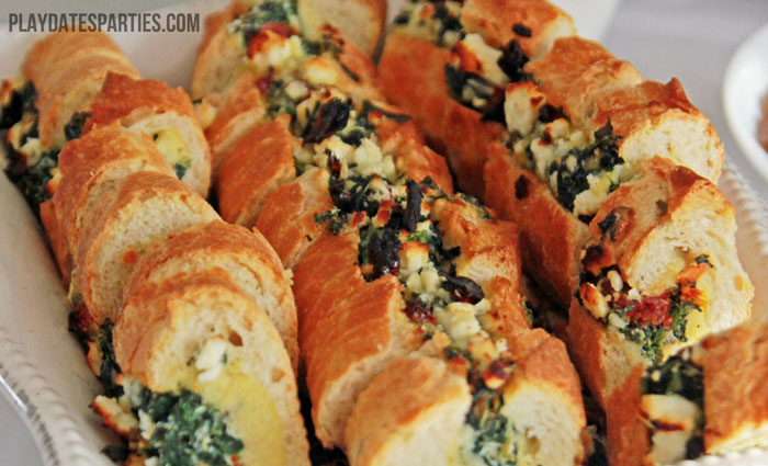 Make ahead bread boats are a a delicious option for a brunch. Shown here served at a brown and white fall inspired baptism for a baby boy.