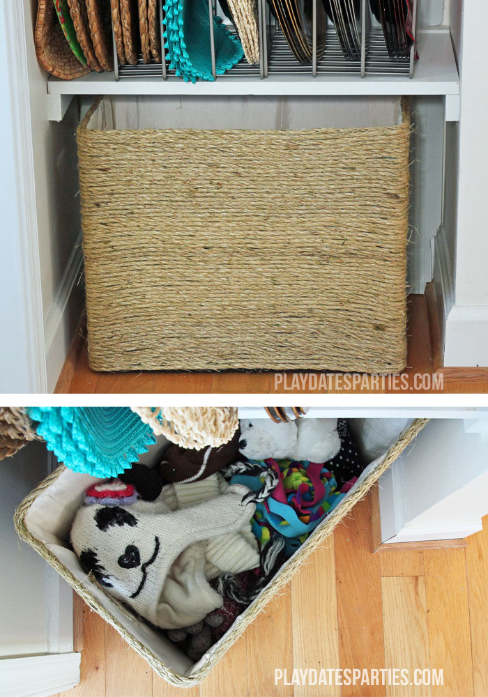 A DIY twine wrapped box provides a fantastic place to hide hats and mittens throughout the winter.