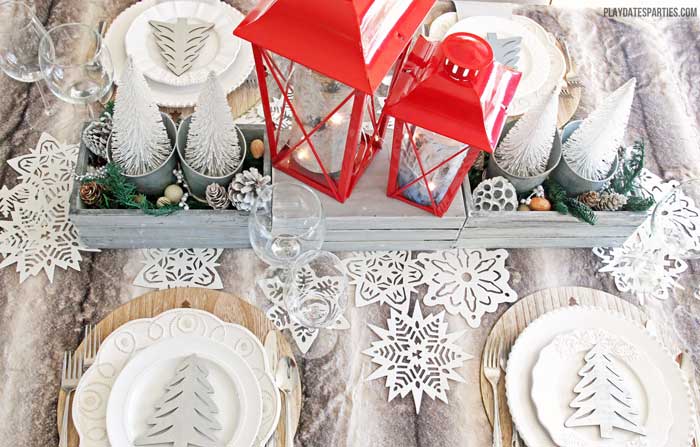 Don't spend a fortune to entertain beautifully! Find out how to make an elegant woodland holiday tablescape you can actually afford to recreate!