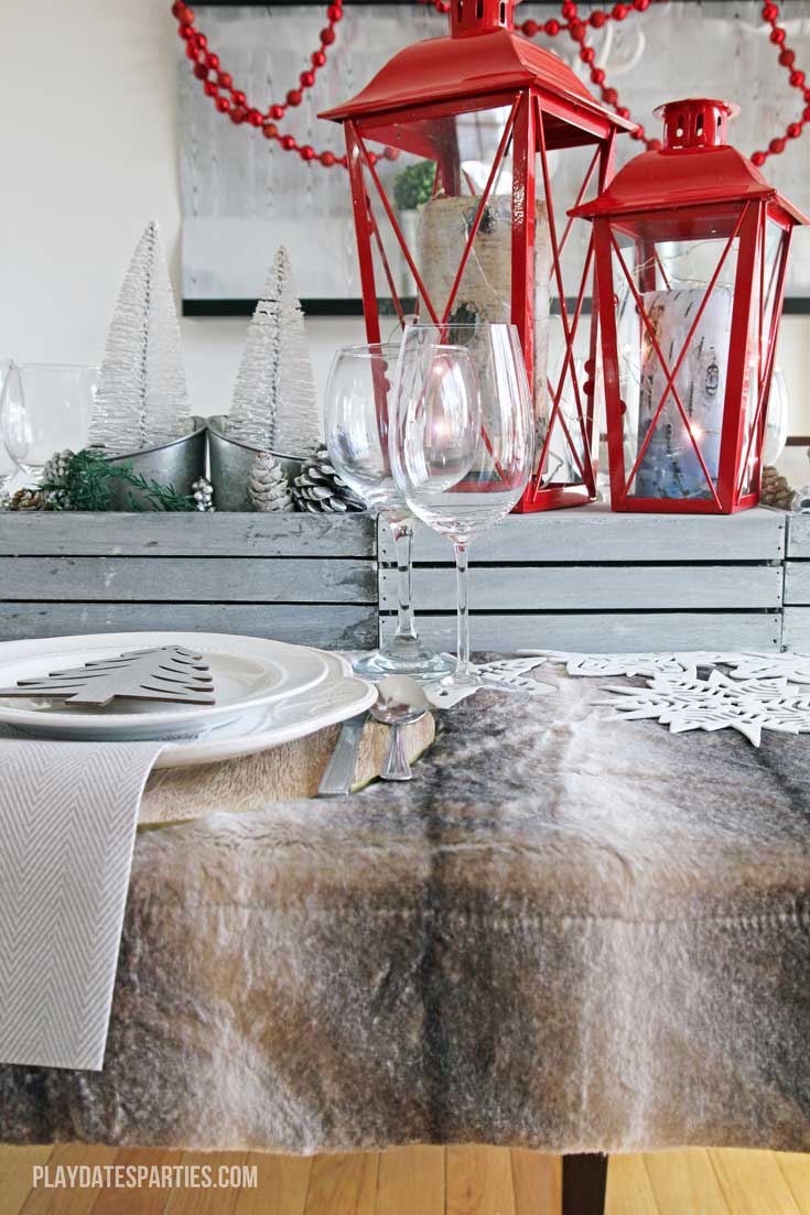 Don't spend a fortune to entertain beautifully! Find out how to make an elegant woodland holiday tablescape you can actually afford to recreate!