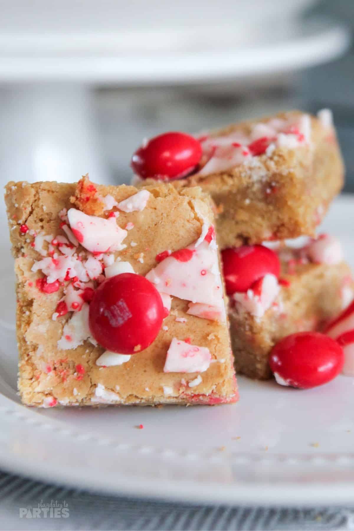 Golden blondies with mint MMs and melted candy cane kisses.