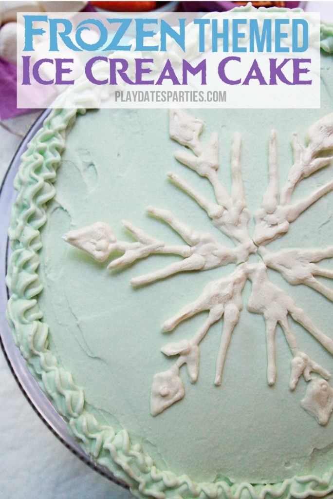 Got a little kid who loves Disney's Frozen? Anyone can make this stunning Frozen themed ice cream cake with layers of white cake, blue and purple ice cream, and then covered with whipped cream frosting and a candy snowflake.