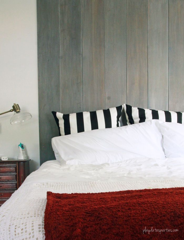 Can you completely change a room in just 6 weeks? In this master bedroom renovation week 5, things are finally coming together, including a sliding pocket mirror, faux vertical shiplap headboard, and a storage wall from multiple customized Ikea products.