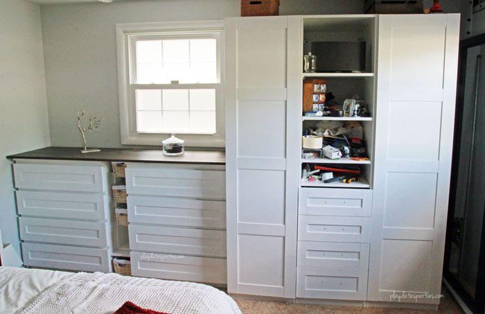 Can you completely change a room in just 6 weeks? In this master bedroom renovation week 5, things are finally coming together, including a sliding pocket mirror, faux vertical shiplap headboard, and a storage wall from multiple customized Ikea products.