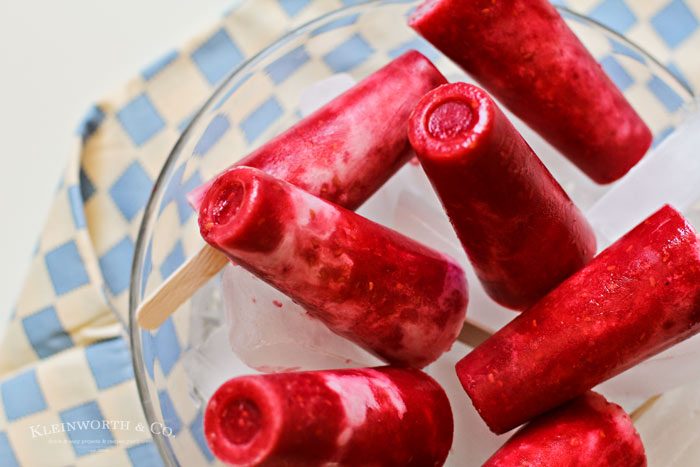 These Raspberry Coconut Pops are so incredibly easy & delicious! The perfect blend of raspberry & coconut in a cool & refreshing pop.