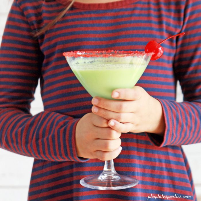 The creamy apple mock-tini #recipe is the perfect easy green mocktail for #kids during the #holiday season. Kids love that this drink is full of surprising flavors, but would you drink it? 