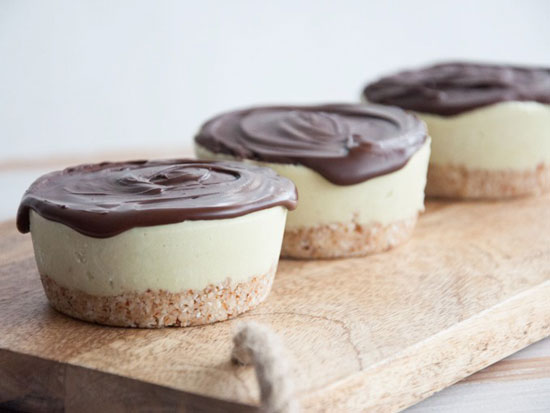 Mini round ice cream cakes with a cracker crust and chocolate topping