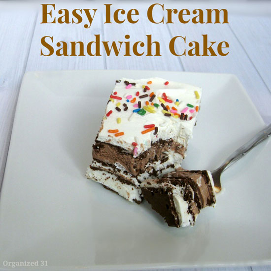 A slice of ice cream sandwich cake on a plate with sprinkles