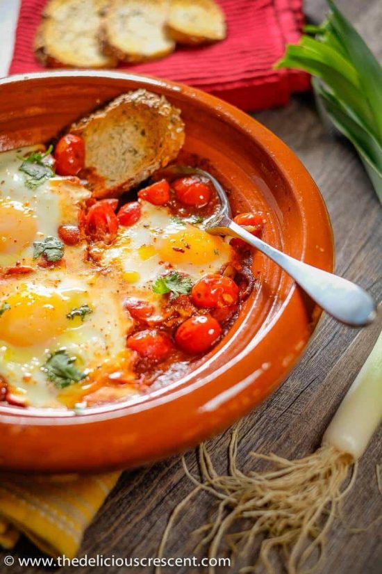 Moroccan Eggs in Tomato Sauce by The Delicious Crescent