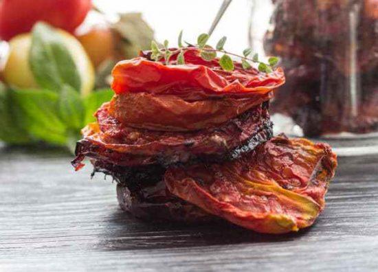 Turn fresh tomatoes into oven dried tomatoes by an Italian in My Kitchen