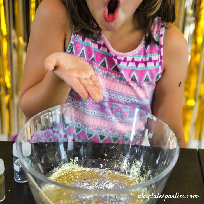 Showing off how much glitter is in this batch of clear slime recipe (no borax)