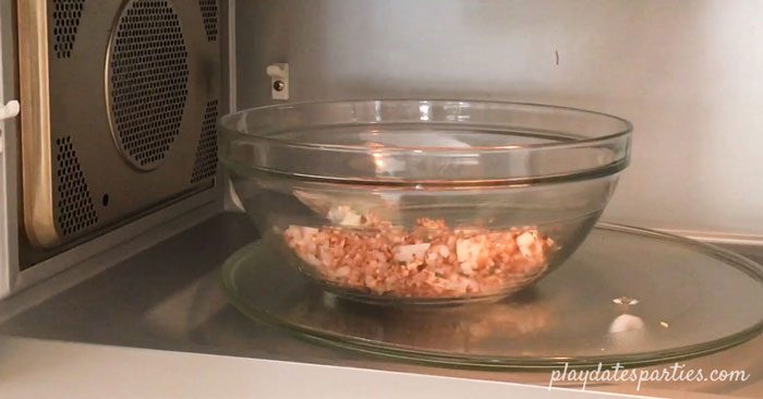 cooking the stuffed mushroom filling in the microwave