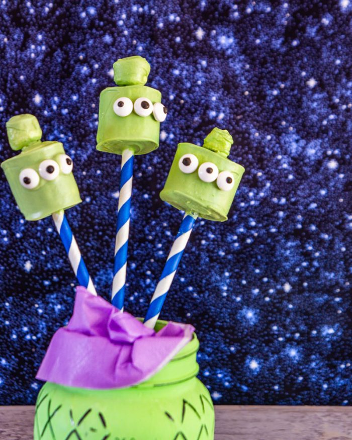 Toy Story alien marshmallow pops display in a painted mason jar