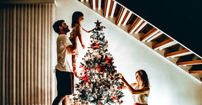 Decorating the Christmas tree as a family