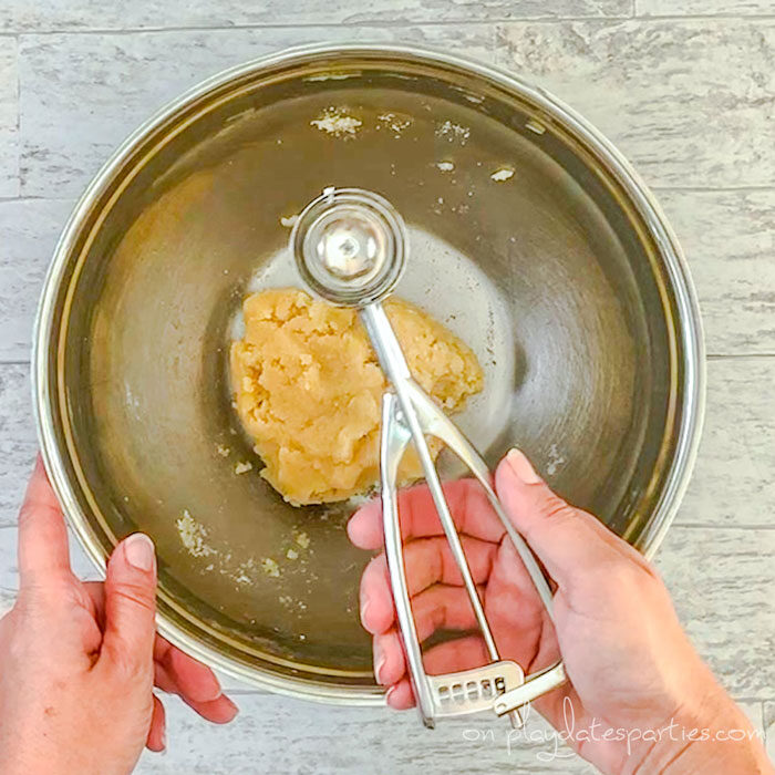 Use a cookie scoop to make your cookies even in size