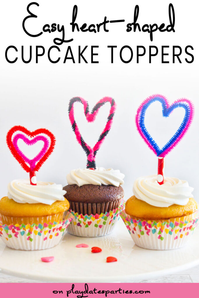 Cupcakes with three different heart shaped cupcake toppers for Valentines Day