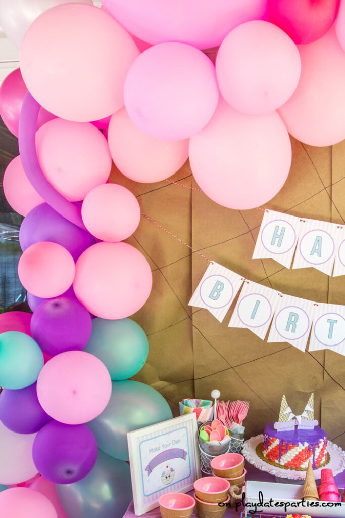 balloon arch made with pink purple and teal balloons - made without helium