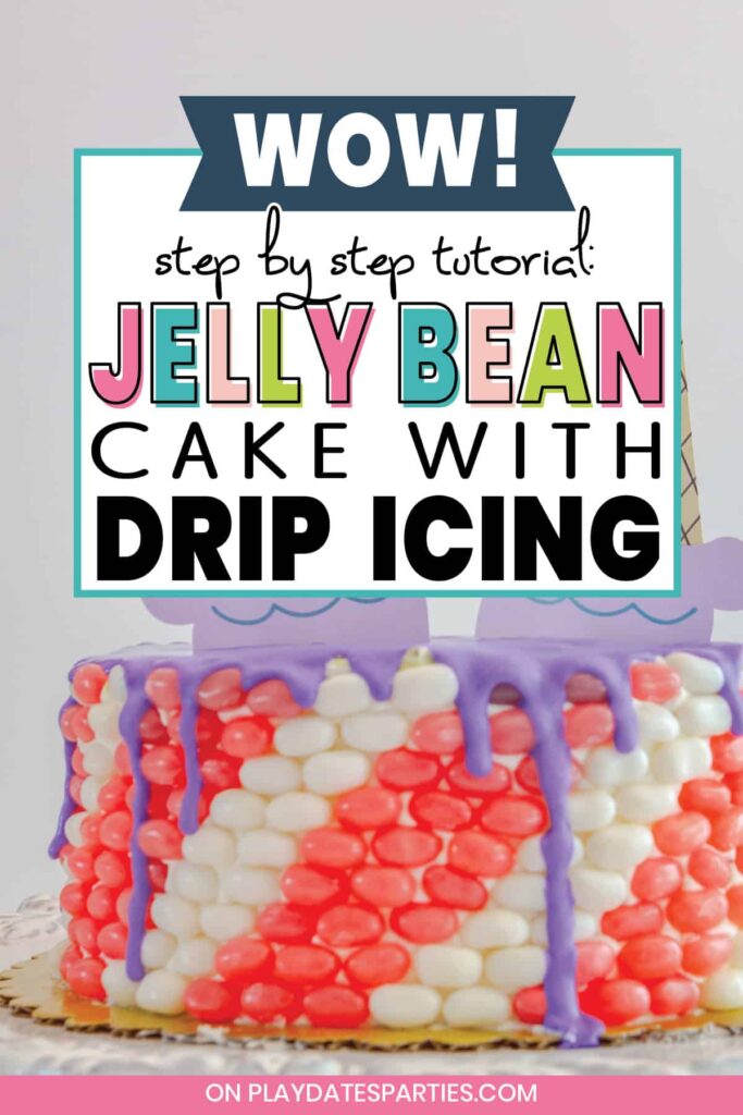 Close up of a pink and white jelly bean cake with the text wow step by step tutorial jelly bean cake with drip icing