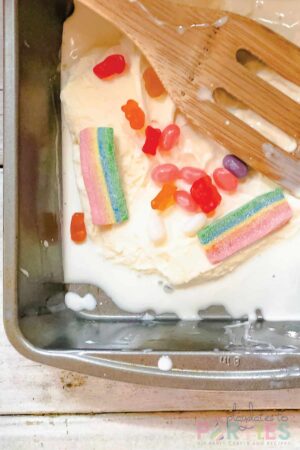 make your own ice cream container with candies being mixed in