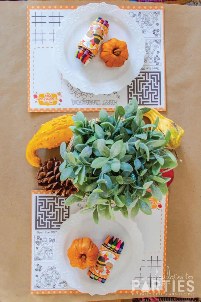 top view off a kids Thanksgiving table with a printable activity placemat