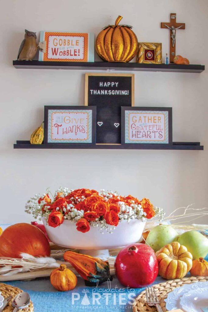 Thanksgiving signs and decorations on wall ledges