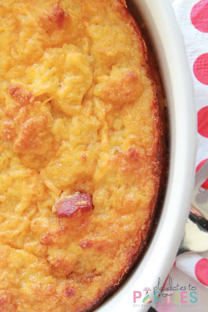 close up of a casserole dish filled with cooked cornbread pudding