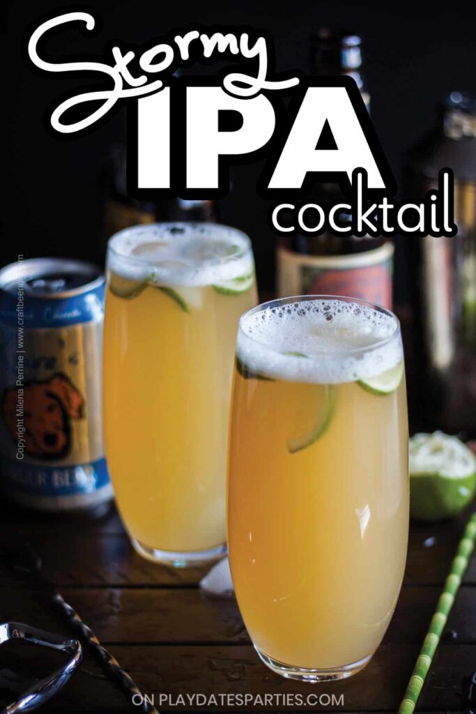 two IPA cocktails garnished with lime and surrounded by cans and bottles of beer