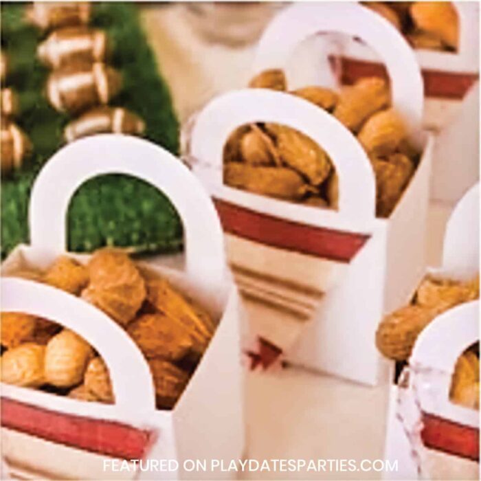 close up of mini boxes filled with peanuts in the shell