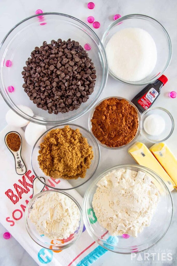 ingredients for chocolate cookies on a marble table