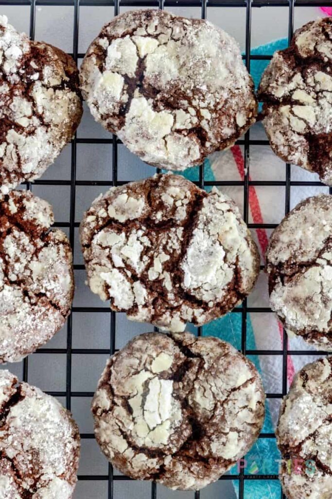 finished double chocolate crinkle cookies on a cooling rack