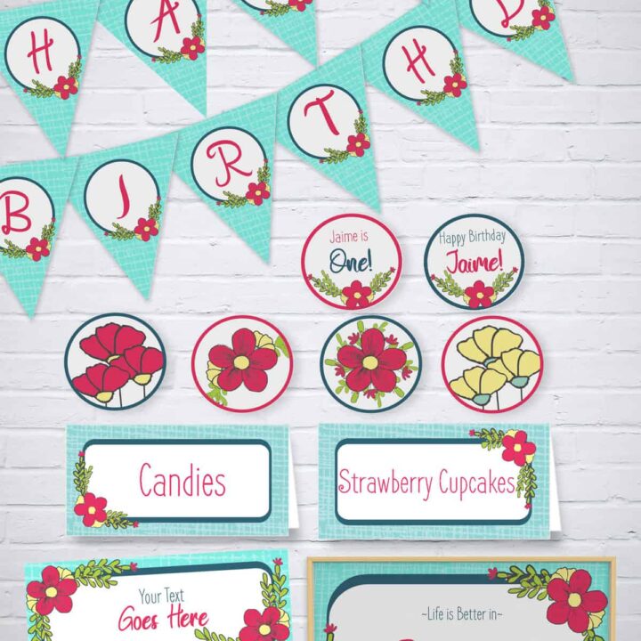 Blue and pink flower party printables banner, party circles, table tents, bag toppers, and sign in front of a white brick background