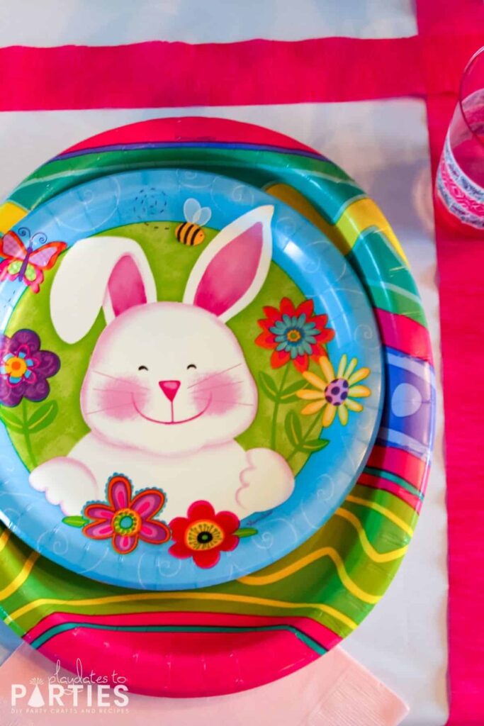 overhead view of colorful Easter plates for kids with a cute bunny face