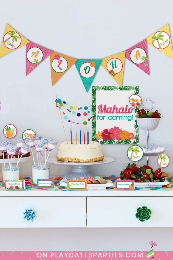 party dessert table a cake and sweet treats decorated with luau party printables
