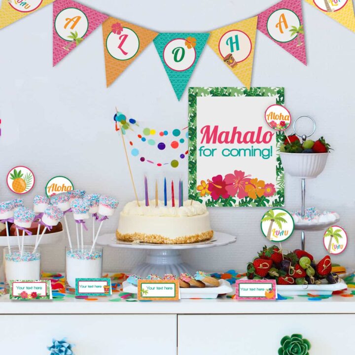party dessert table a cake and sweet treats decorated with luau party printables
