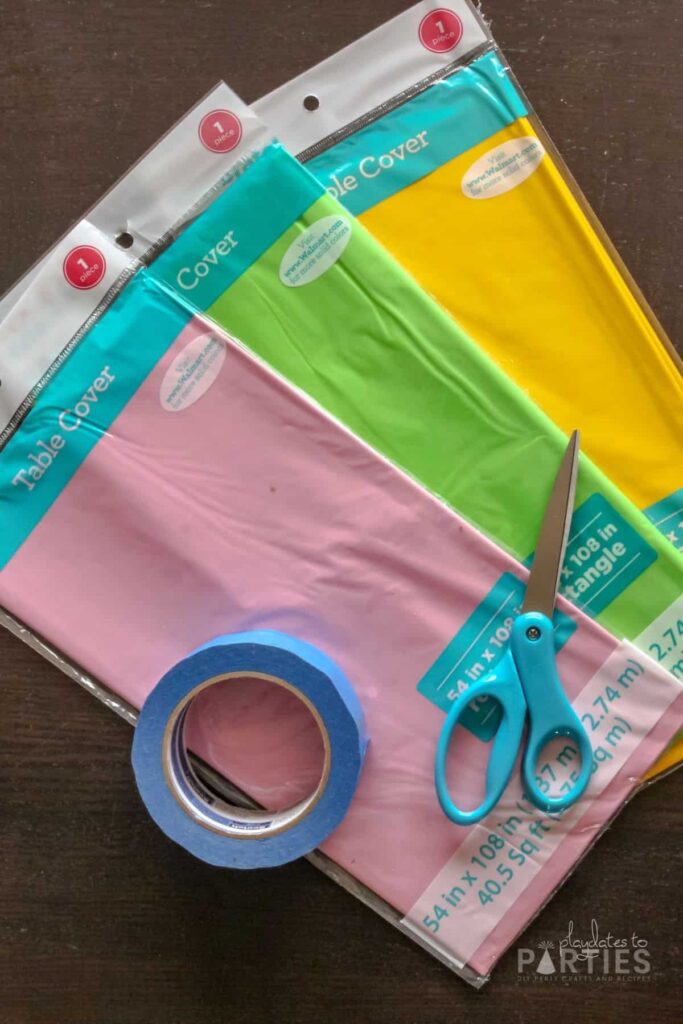 DIY Braided Plastic Tablecloth Party Backdrop