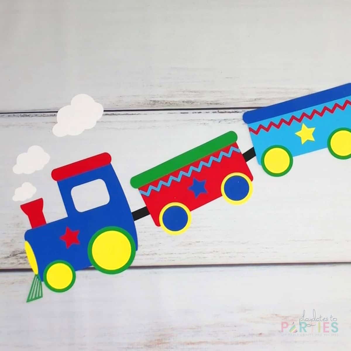 train decorations on a white wood table
