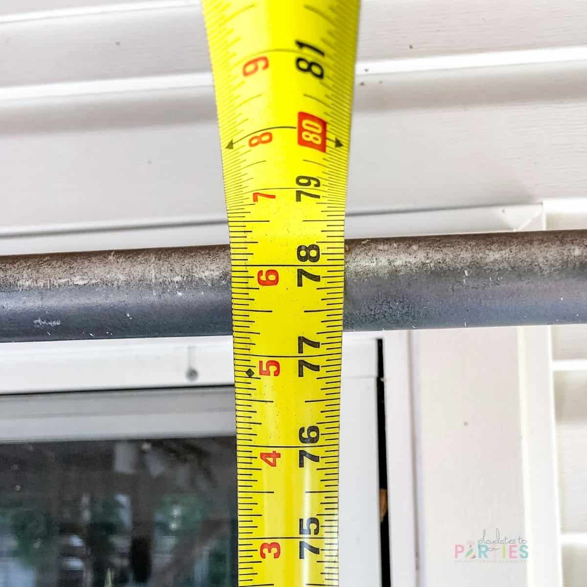 measuring the height of the top of the backdrop frame