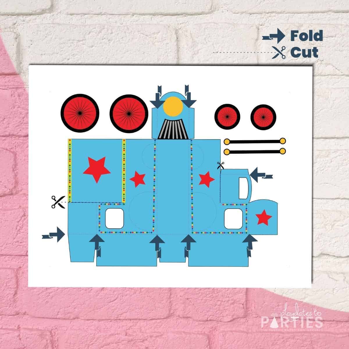graphic showing the cut and fold lines for making the train favor by hand